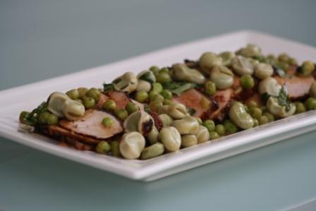 ITALIAN GRILLED LOIN OF PORK MARINATED WITH ROSEMARY, BAY LEAVES, GARLIC AND BALSAMIC VINEGAR, WITH BROAD BEANS AND PEAS